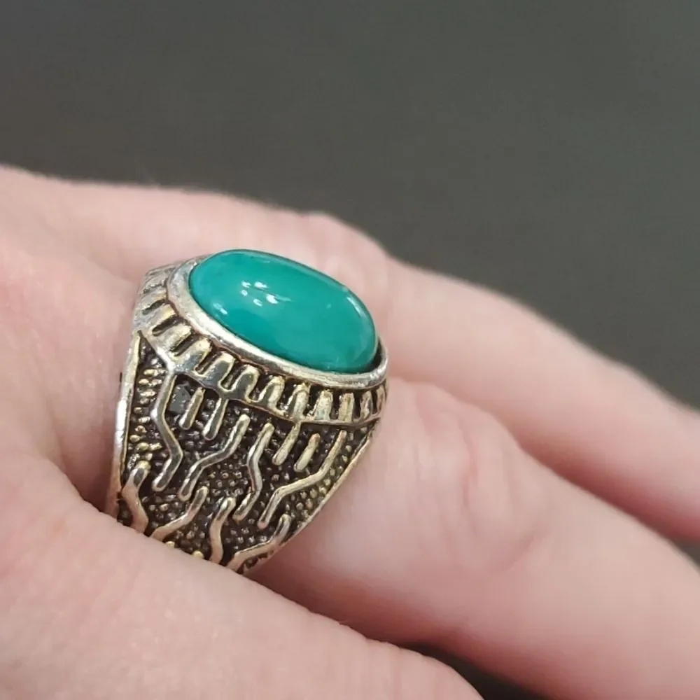 Silver tone ring with blue size 10.25